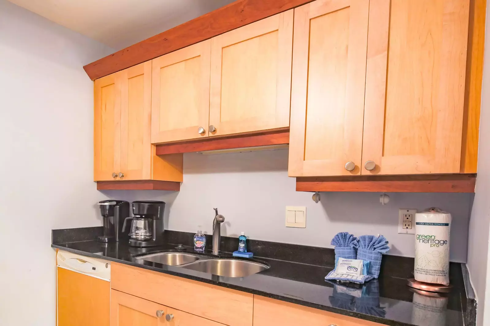 There is also a dishwasher, sink and coffee maker.
