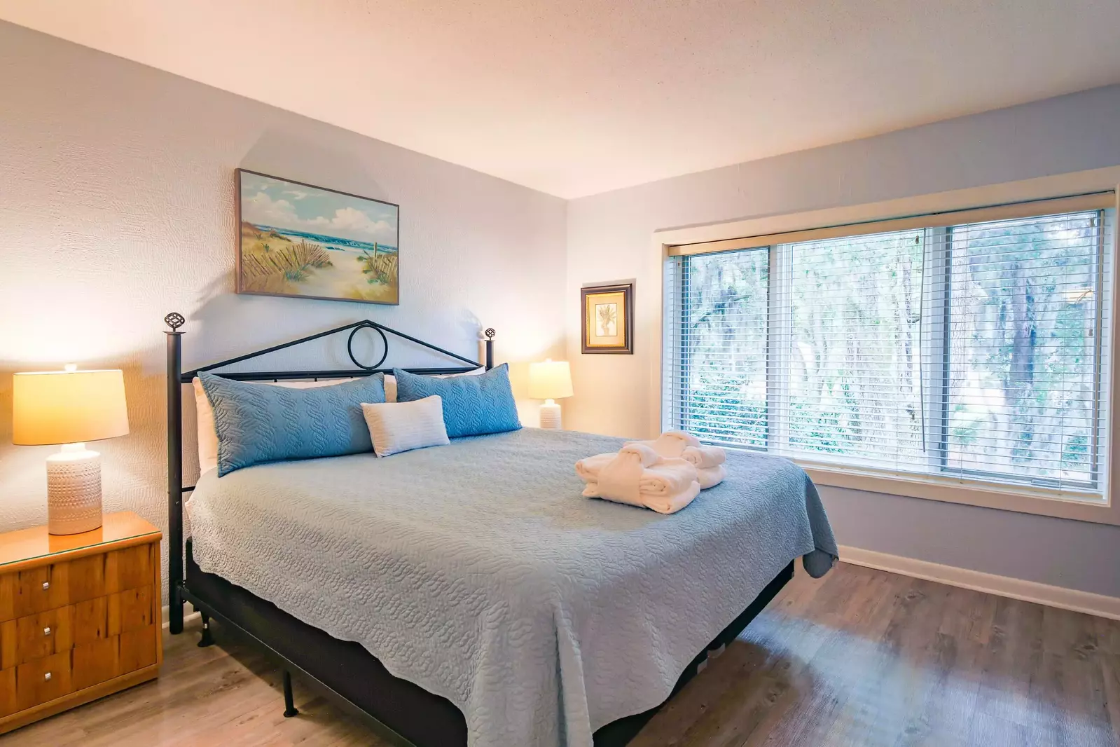 The master suite has lovely views of the trees behind the villa.