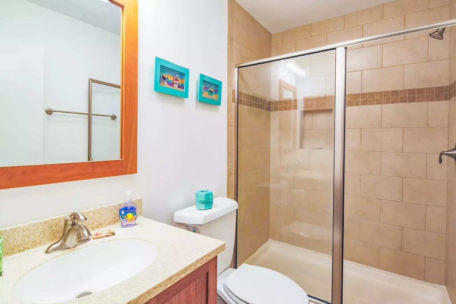 The en suite bathroom also has a tiled, walk-in shower.