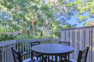 Dine al fresco on the back deck overlooking the lagoon below.