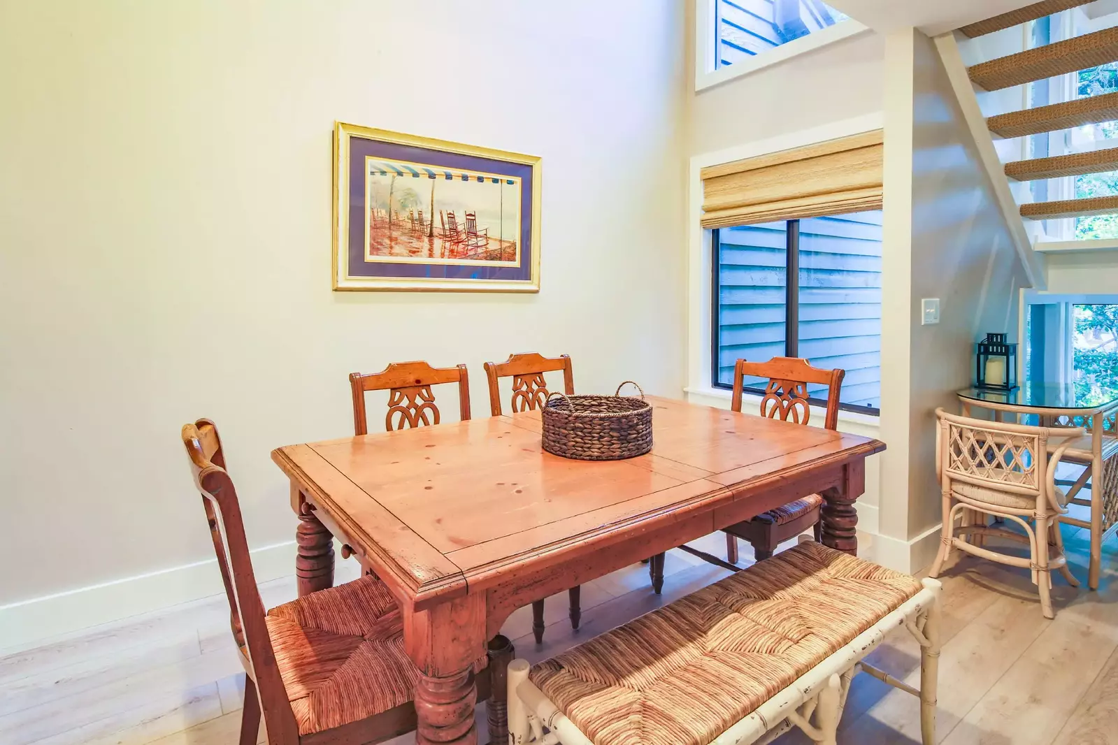 The dining table comfortably seats 4.