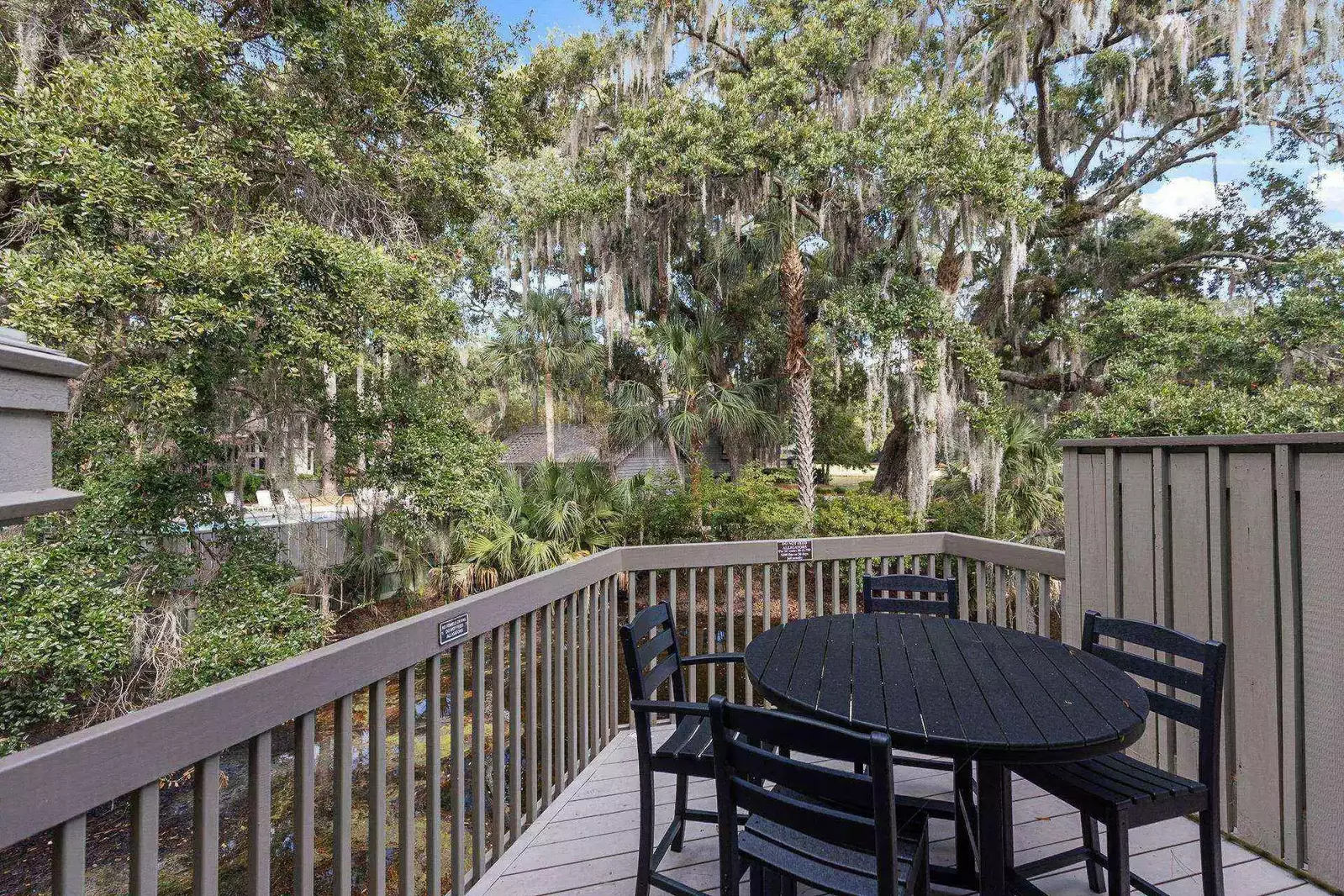 You can access this expanded deck with table and chairs from the living room.