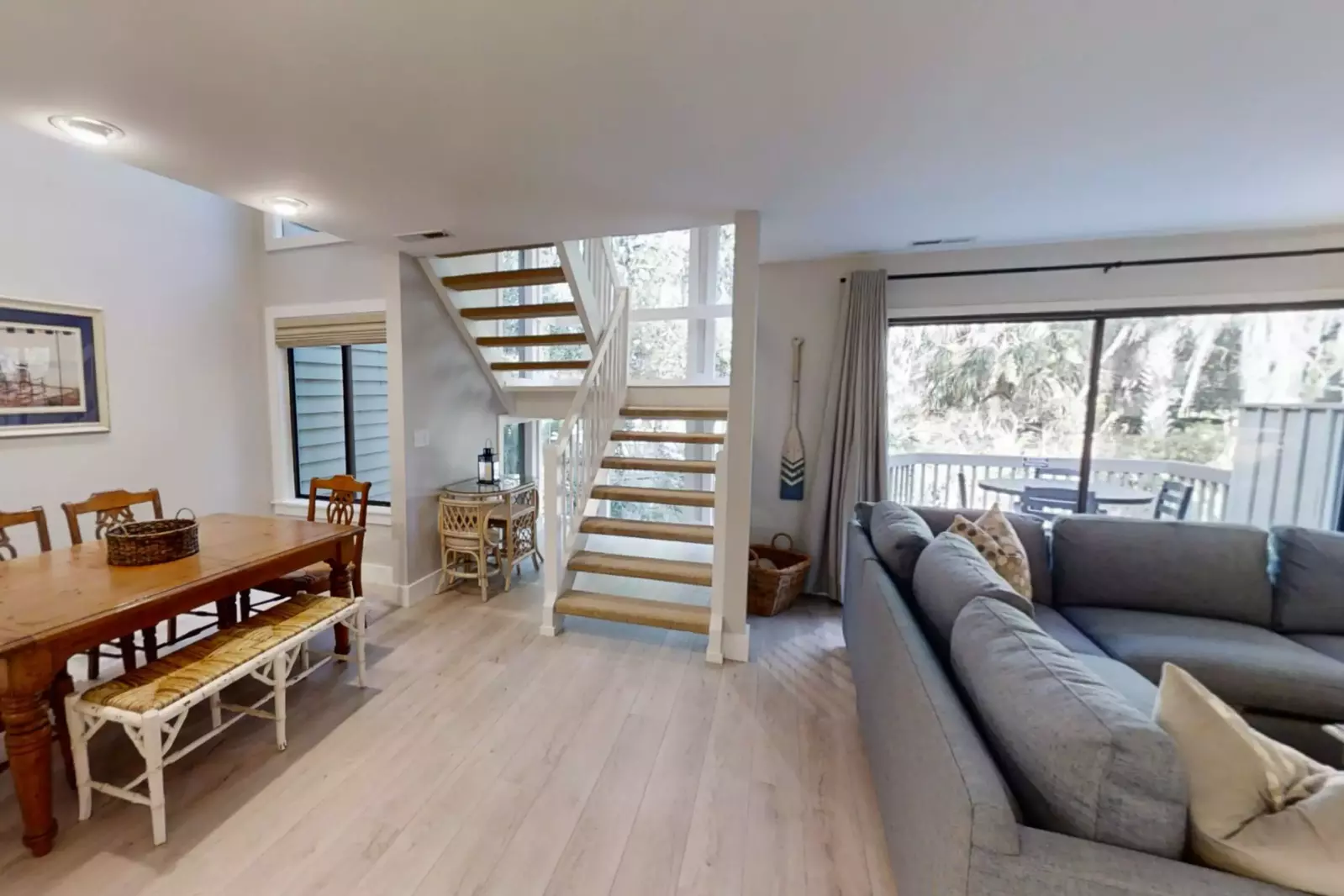 The stairwell in between the living room and dining area takes you to the second floor.