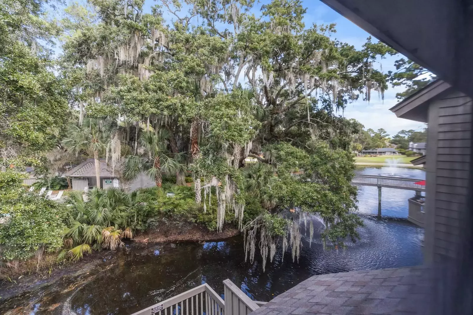 You can see the lagoon, pool, bridge and golf course from the upper level of the home.