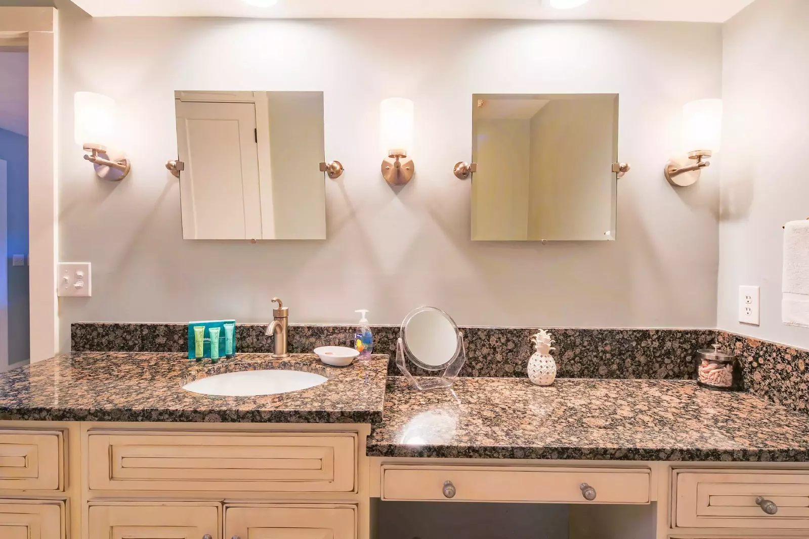 The master en suite bathroom features a spacious vanity and makeup counter.