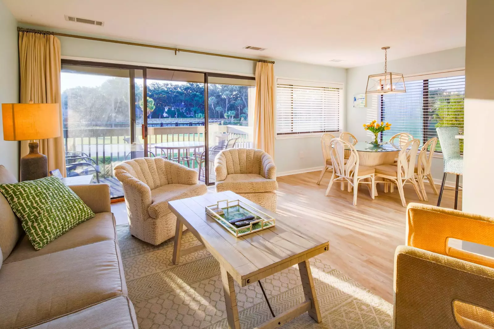 The sliding glass door provides great views of the golf course and access to the back porch.
