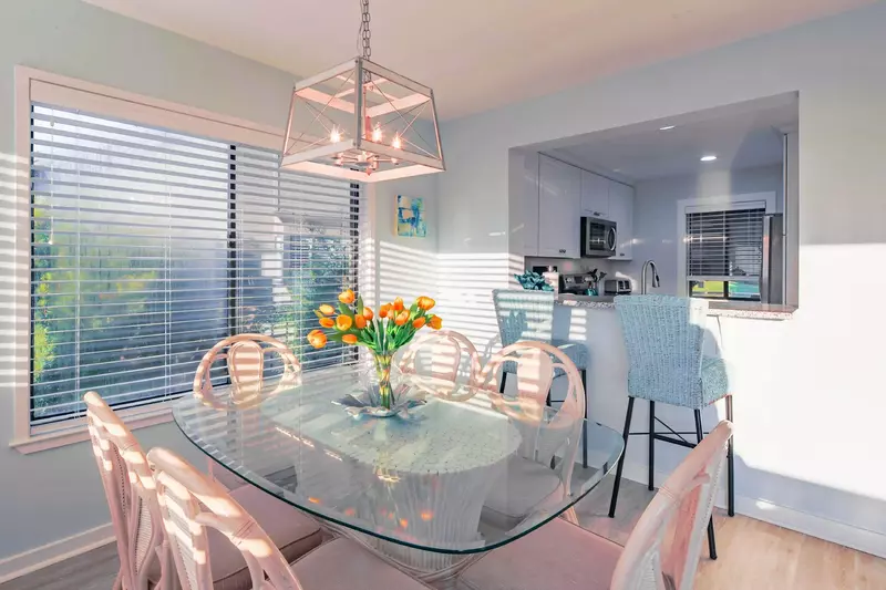 It is easy to interact with your guests in the kitchen, dining area and living room.