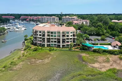 The Captains Quarters community is located alongside Broad Creek and Shelter Cove marina.