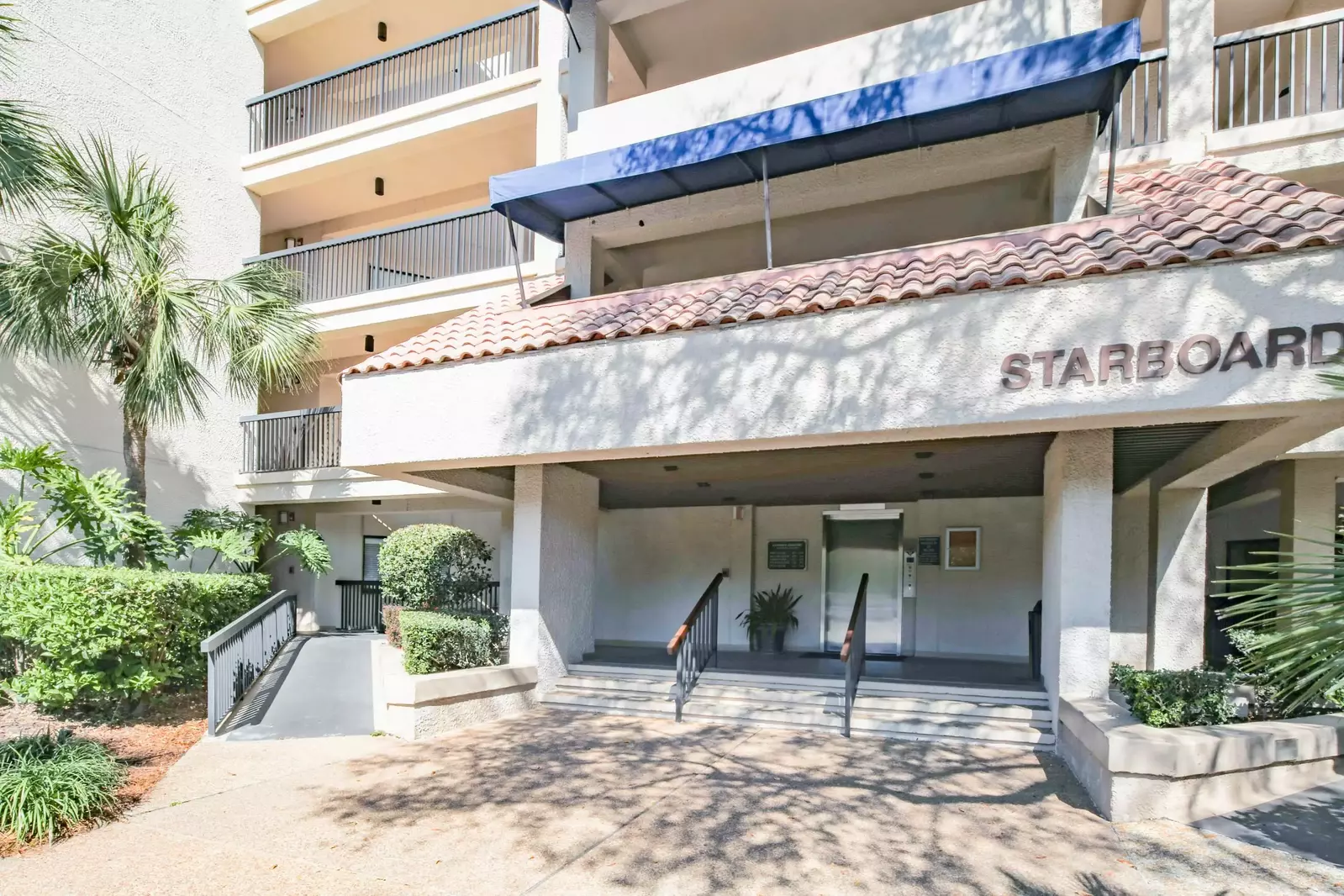 Entrance to the condo is easy.  Just take the walkway on the left and the entrance is straight ahead.