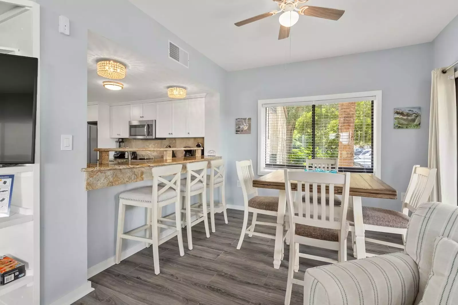 Plenty of table and counter space for 7 people.  Expand the table for more formal dining or games.