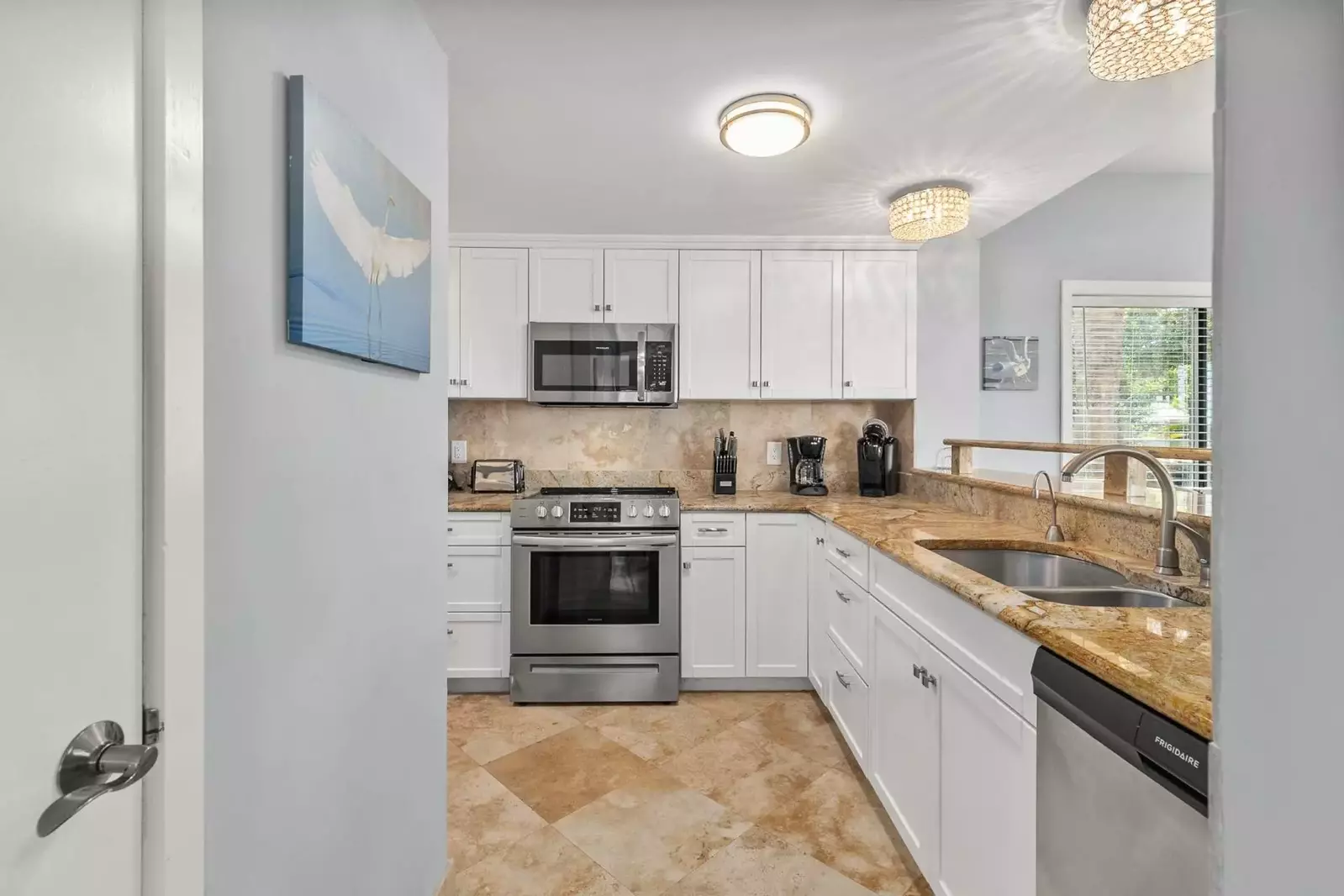 There's plenty of room within the spacious kitchen to prepare your family's meals.