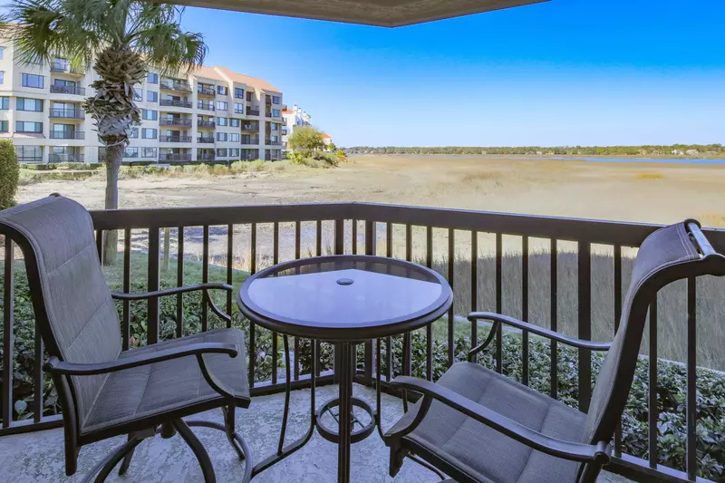 Step out onto the covered private balcony off of the master suite to enjoy these magnificent views.