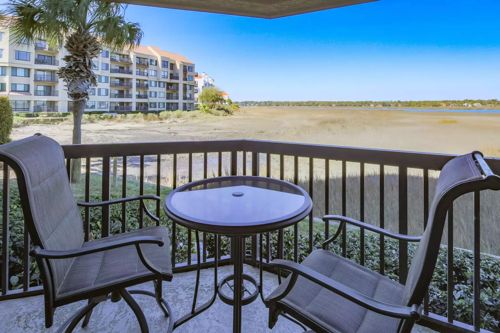 Step out onto the covered private balcony off of the master suite to enjoy these magnificent views.
