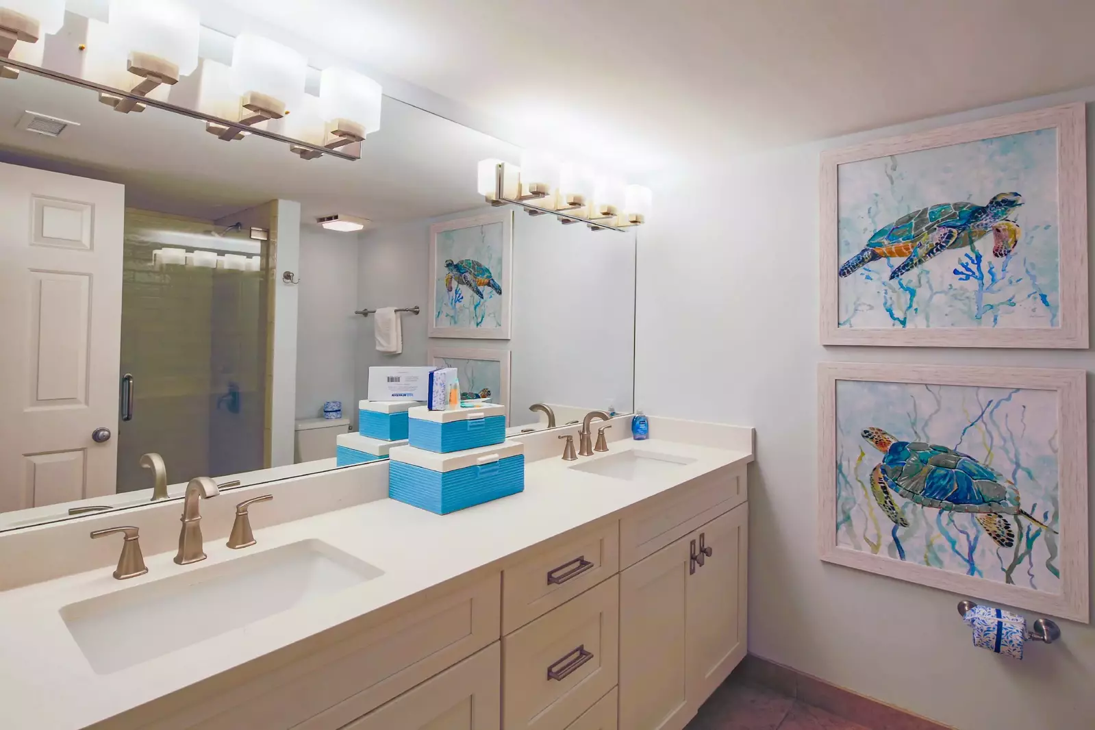The en suite bathroom features a dual sink vanity.