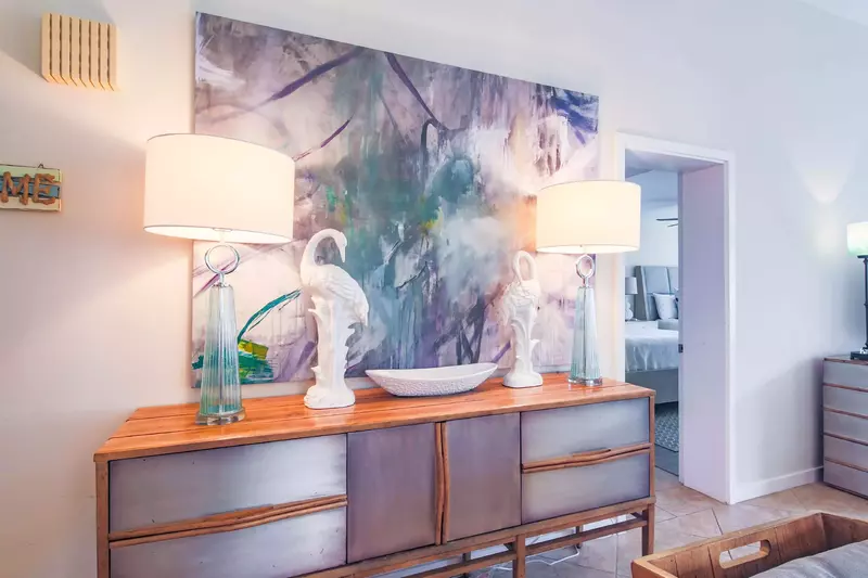 The doorway to the guest suite is located near the living room and dining area.