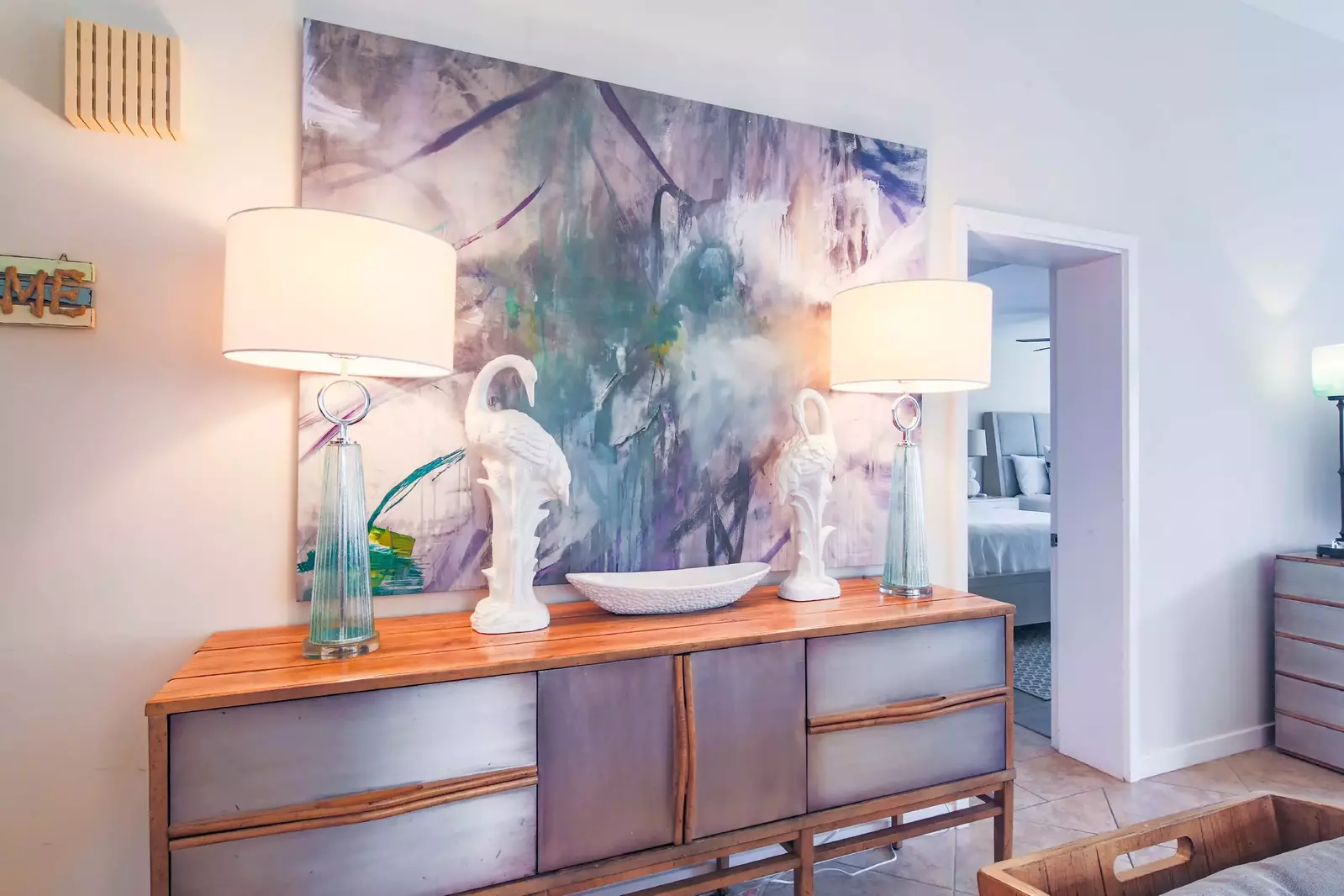 The doorway to the guest suite is located near the living room and dining area.