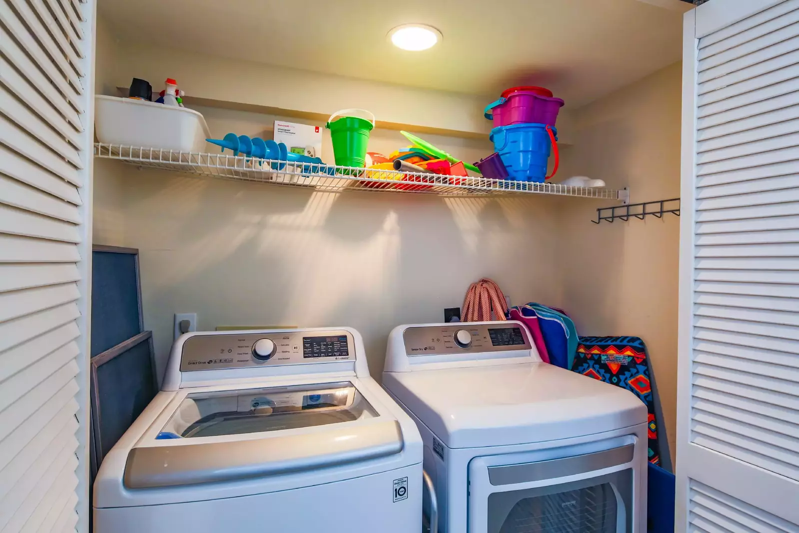 There is a full sized washing machine & dryer in the laundry closet.