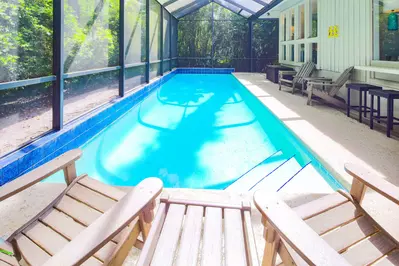 Relax in the pool or enjoy some sunshine in the poolside Adirondack chairs.