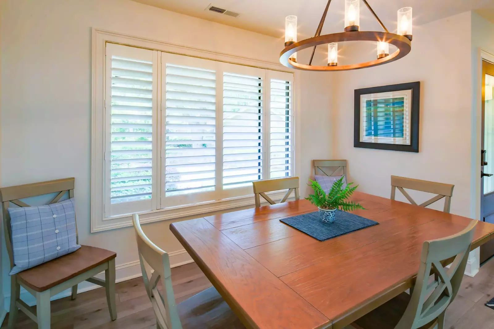 This renovated home features fabulous light fixtures, furnishings and flooring.