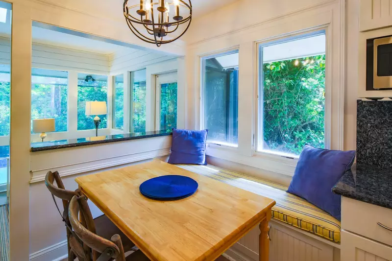 The banquette seating area in the kitchen seats 4.