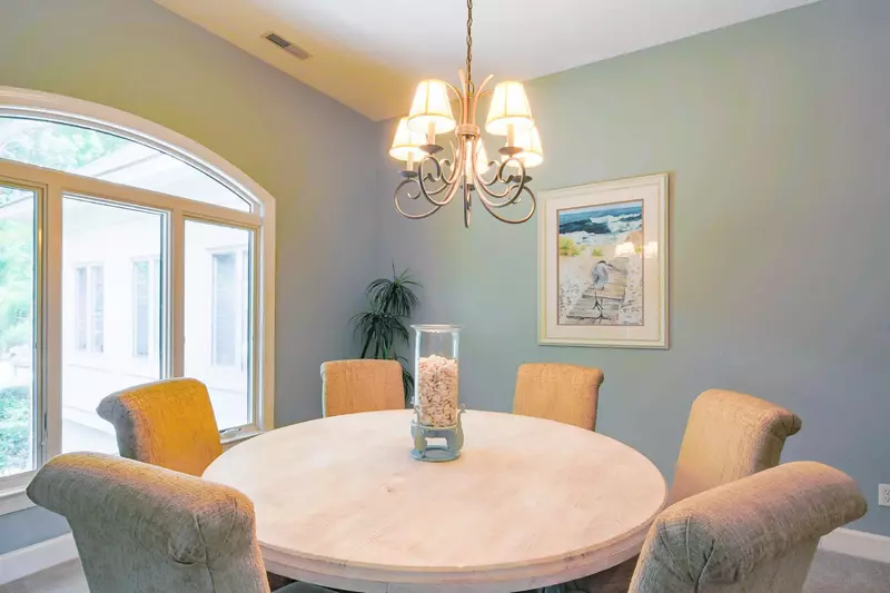 There are mulitple dining tables in the home.