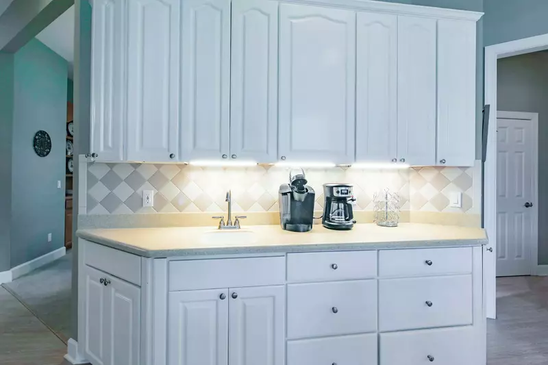 There's a coffee bar and mini sink in the kitchen.