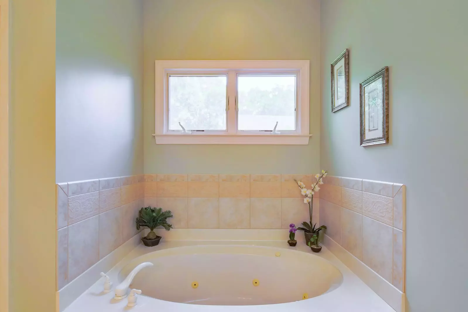 The en suite bathroom also has a soaking tub.