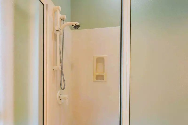 The jack & jill bathroom features a walk-in shower.