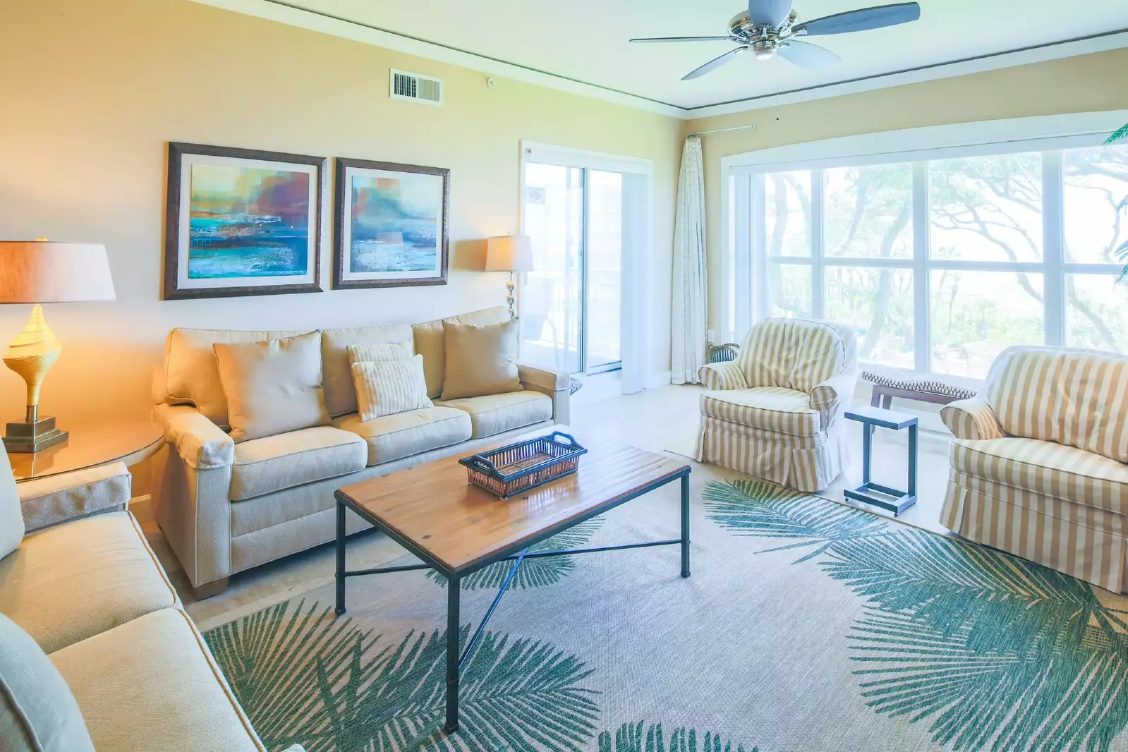 The living room features ocean views, a spacious seating area and lovely natural light.