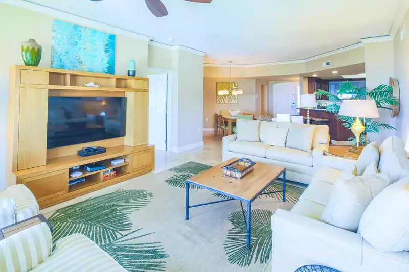 The living room opens into the kitchen and dining area.
