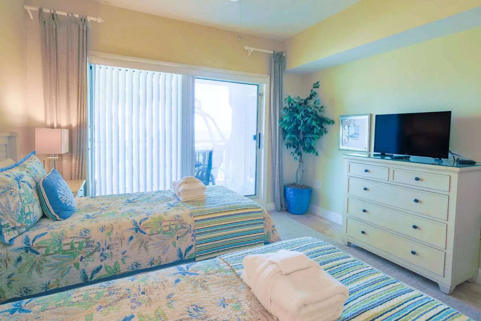 The guest suite also featuers a dresser and TV.