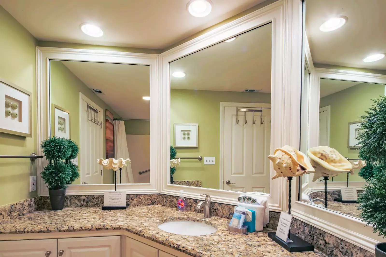 The en suite bathroom features a spacious vanity.