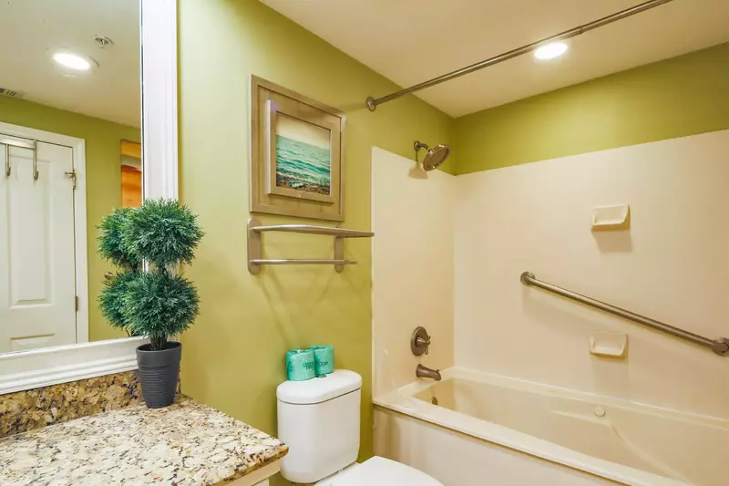 The guest en suite also features a shower/tub combo.