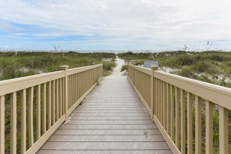 Follow the Hampton Place boardwalk to the beach.