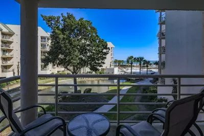 Step out of the master suite to enjoy ocean breezes and this amazing view.