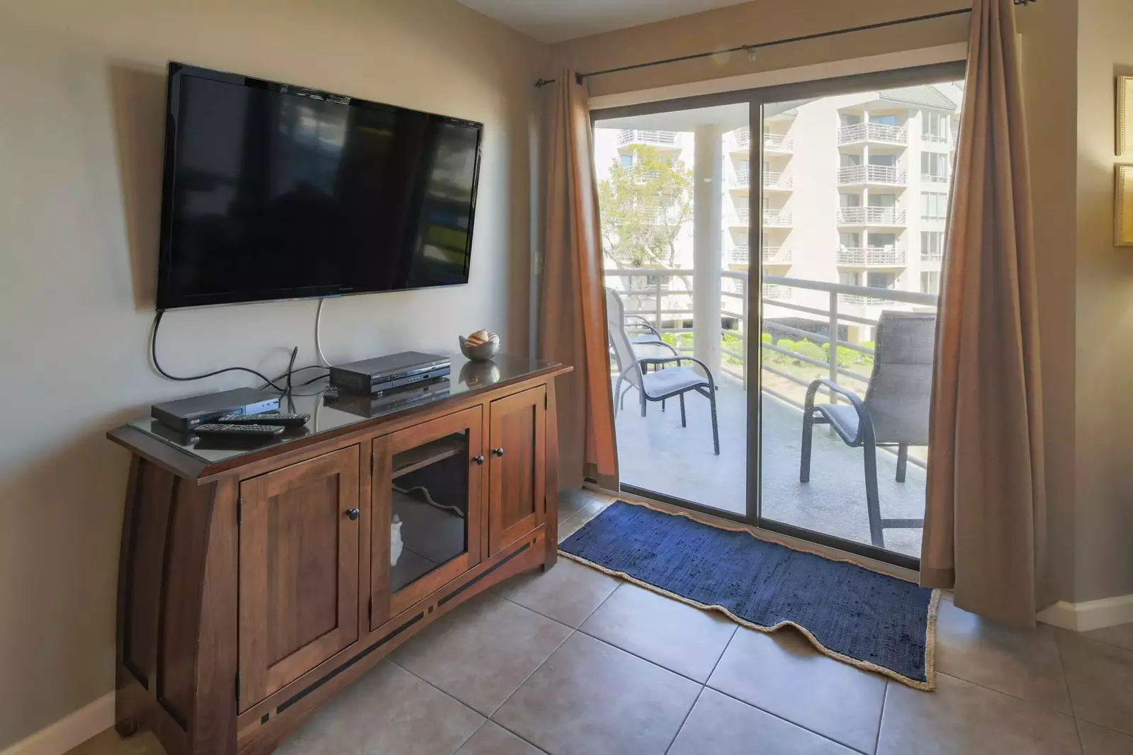 The covered balcony off of the living room is also accessible from the master suite.