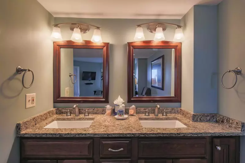 There's plenty of room to store your personal belongings on the master bathroom vanity.