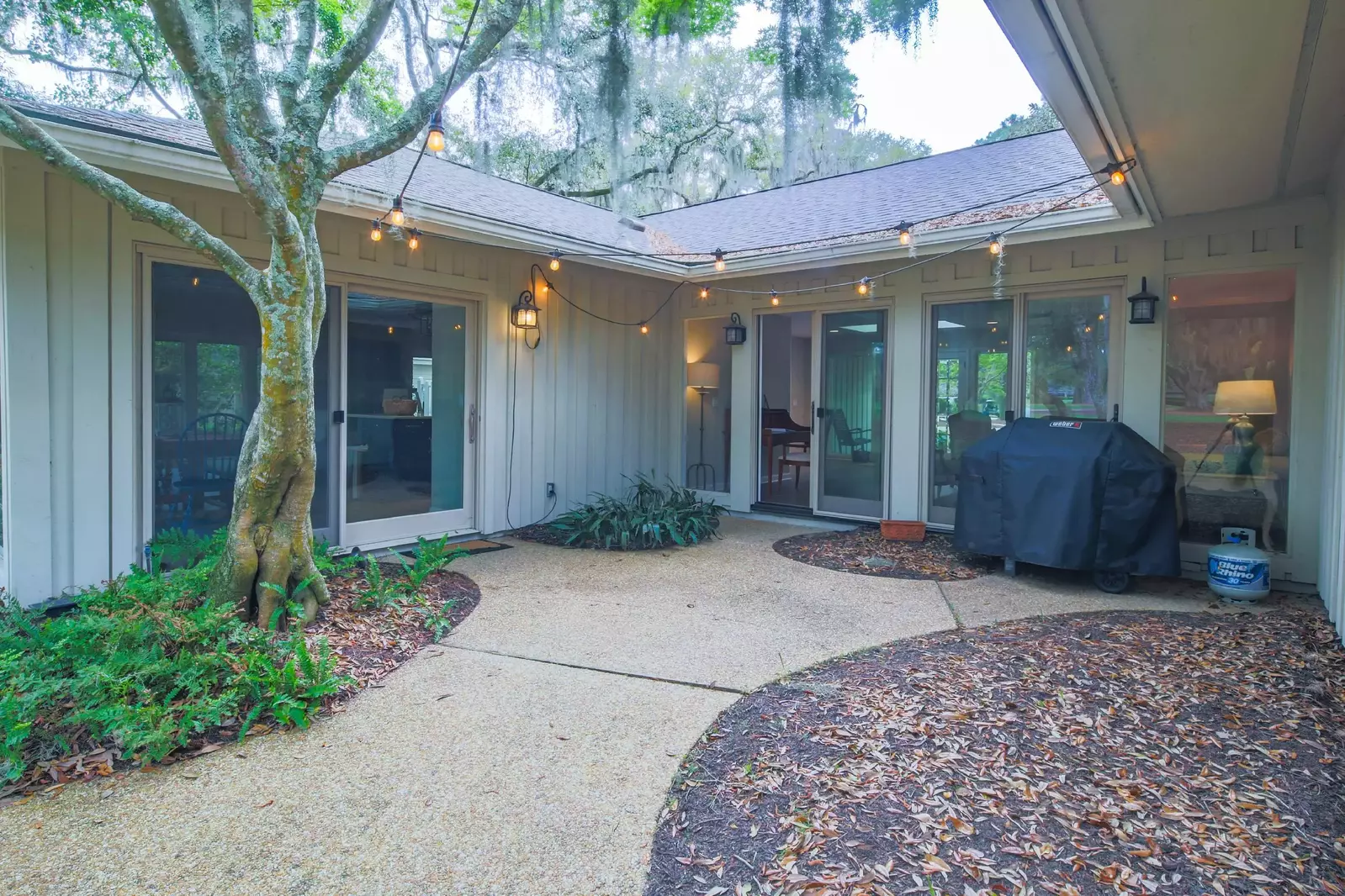 You can access this patio from either the living room or the dining area.