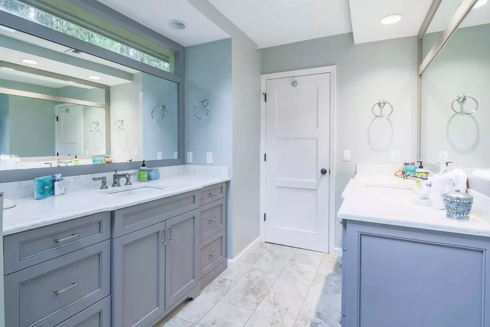 The en suite bathroom features two spacious vanities.