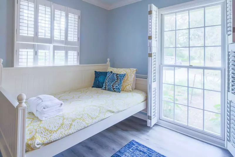 The twin day bed can be used for lounging, reading or sleeping.