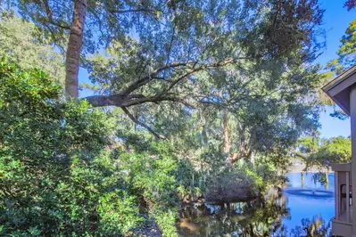 There are views of the lagoon behind the villa from the back deck.