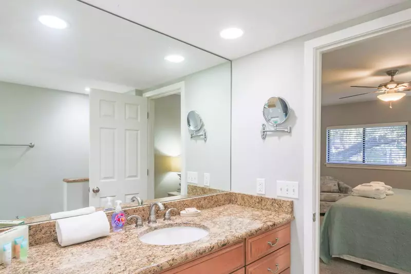 This en suite bathroom for the master suite features a spacious vanity.