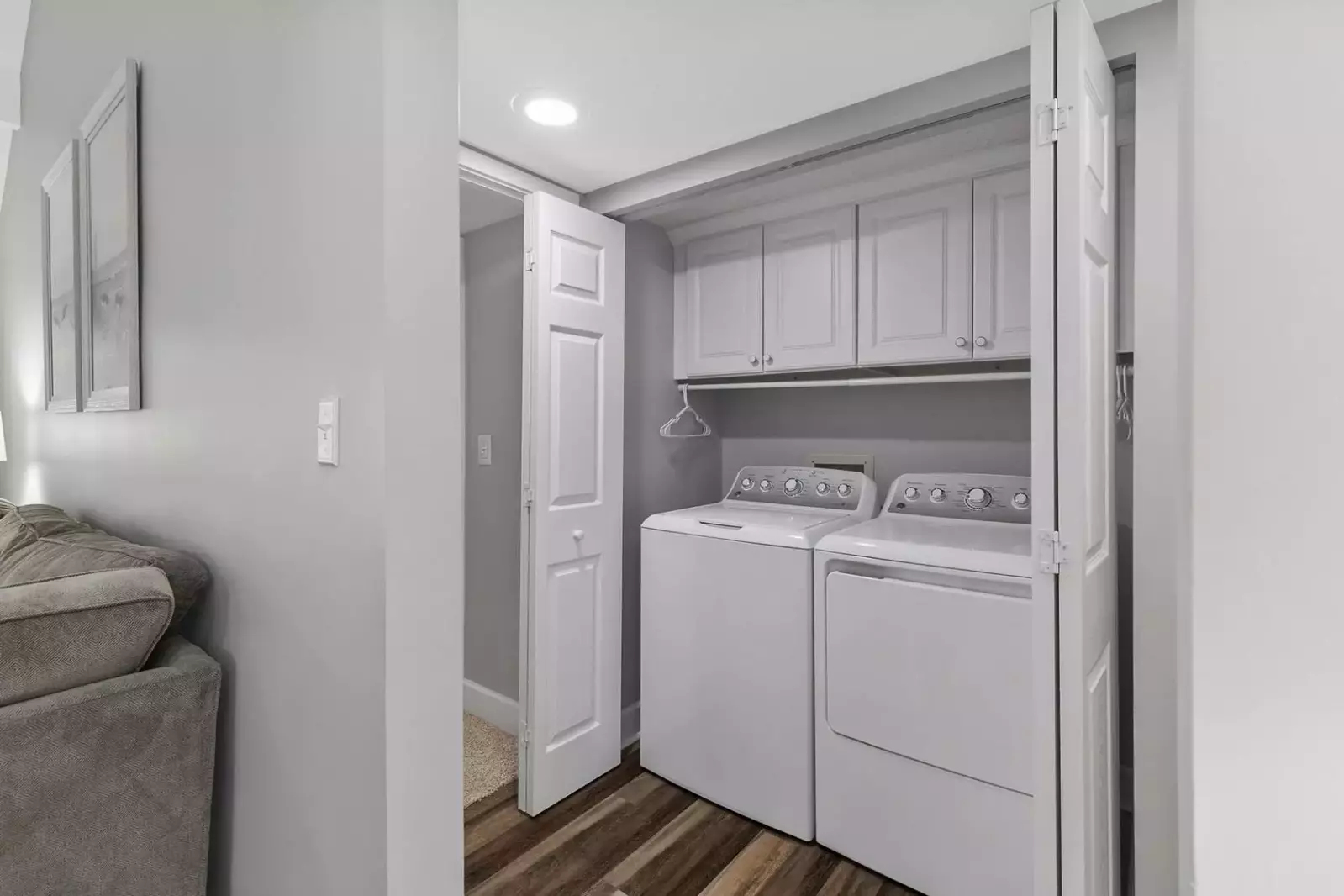 Full size laundry center on first floor with new high efficiency washer and dryer.
