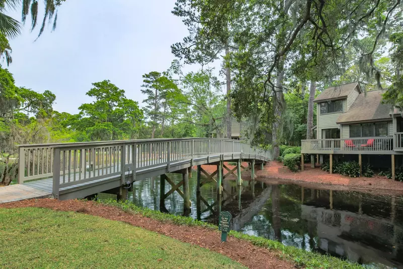 Follow this bridge to cross the lagoon and access the community pool.