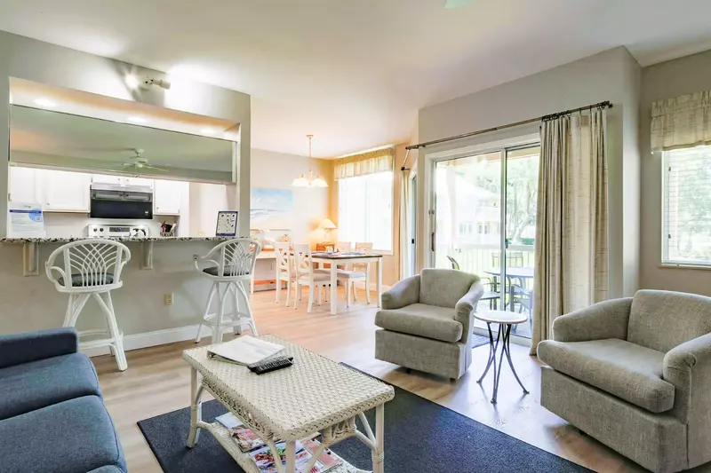 The living room opens into the kitchen and dining area.