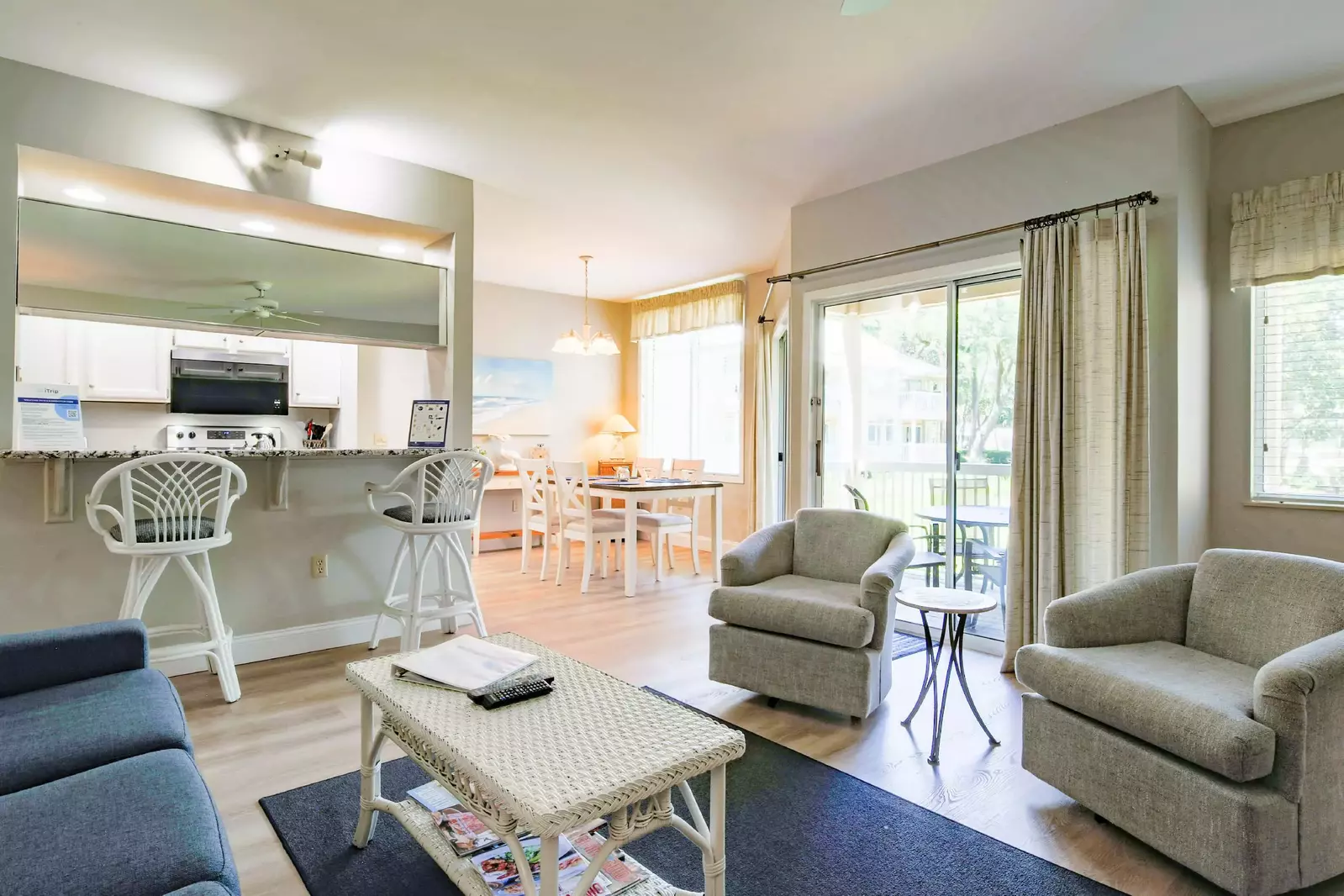The living room opens into the kitchen and dining area.