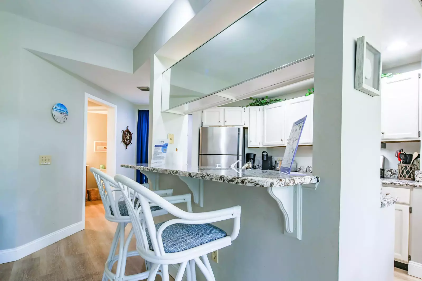 The bedroom is located on the other side of the kitchen.