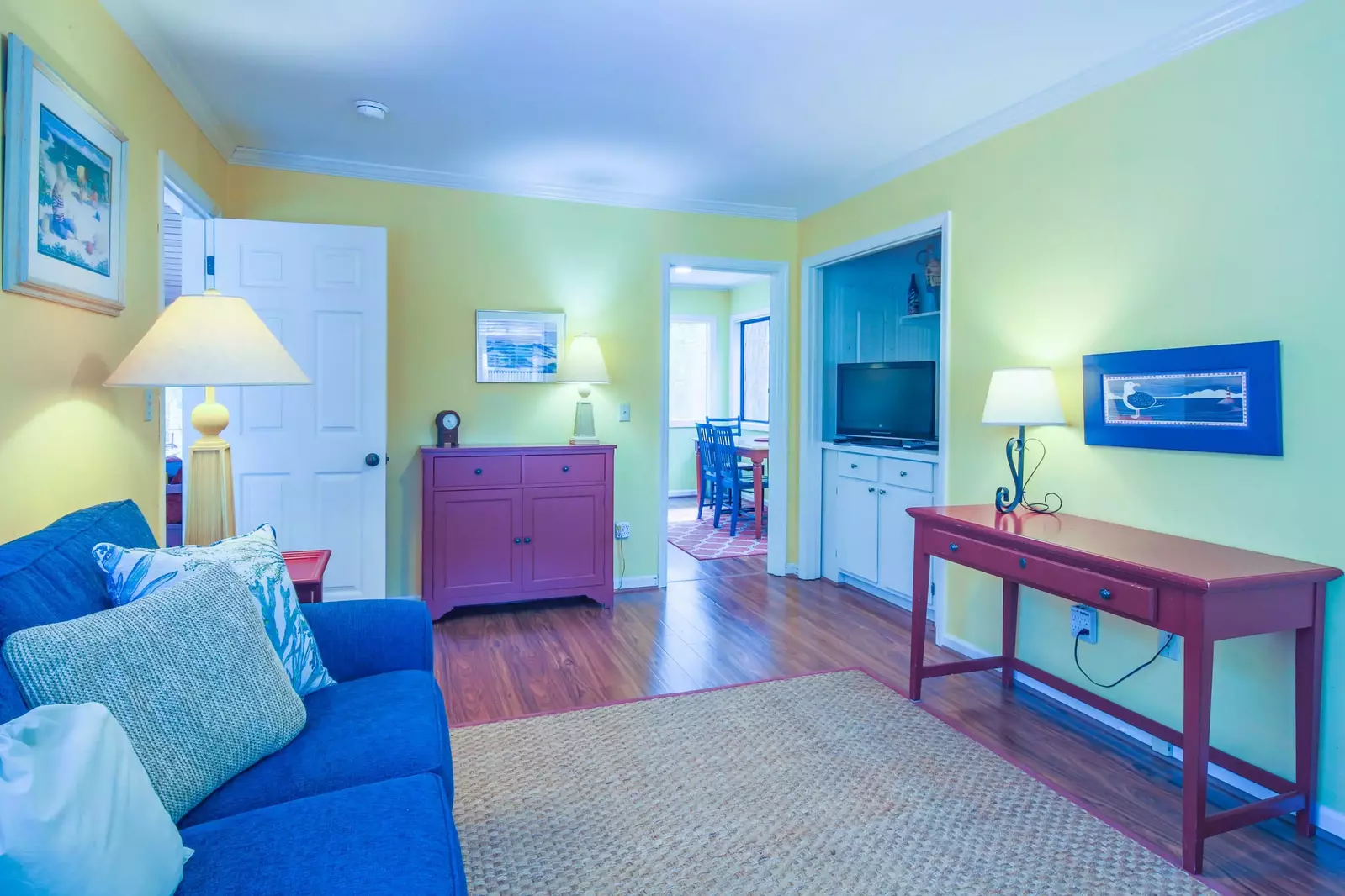 The family room features a seating area and flat screen TV.