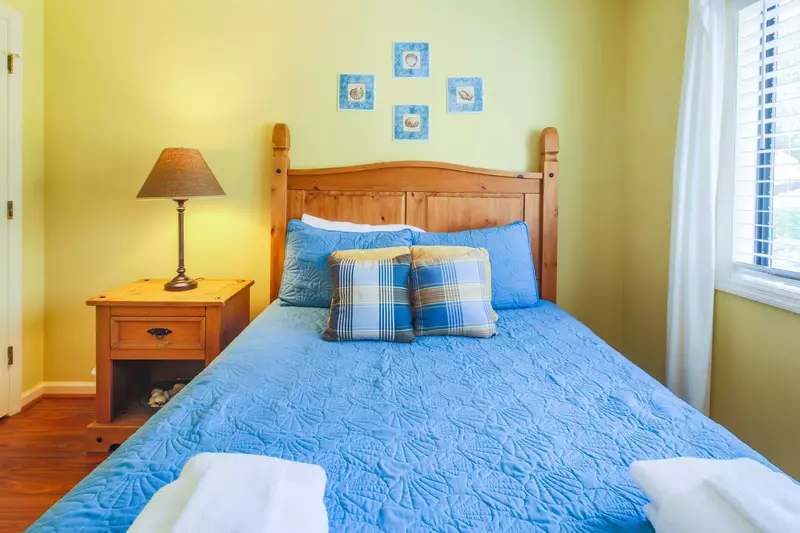 This room receives lovely natural light through the window that faces the street.