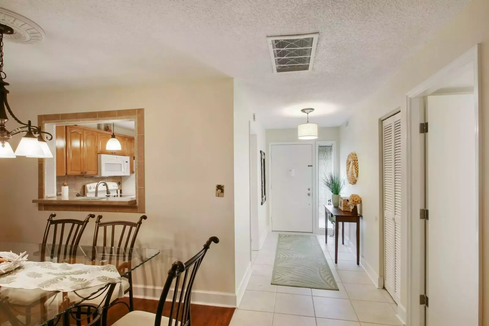 Entry way opens to Kitchen, Dining and 2nd Bedroom Suite